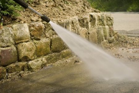 Organic Growth And Your Property: How Professional Pressure Washing Keeps Your Home Or Business Protected